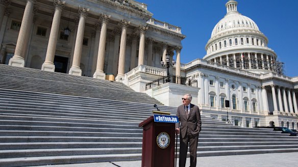 Senate Minority leader Harry Reid on the steps of the Capitol. 