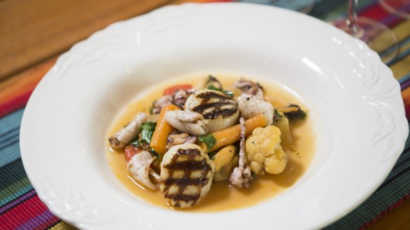 Go-to dish: Scallops, grilled calamari, and mussels with vegetables a la grecque.