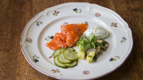 Salmon gravlax, creme fraiche and pickled cucumber.