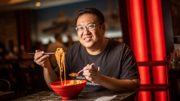 Do Dee Paidang's owner Boon Low with the resturant's ultra spicy tom yum soup.