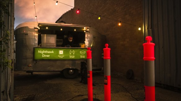 Nighthawk's custom-built kitchen is housed in a shiny Airstream trailer.