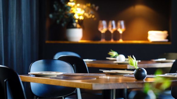 The refurbished, moody dining room.