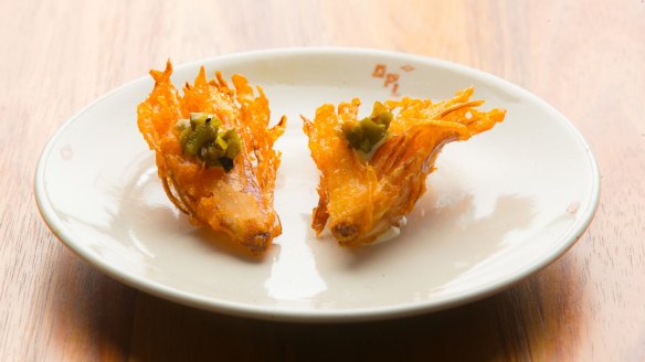 Like a bloomin' onion in miniature: fried shallot with jalapeno cashew sour cream