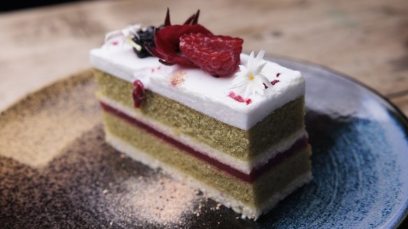 The hibiscus cake is a snowy symphony of basil olive oil sponge.