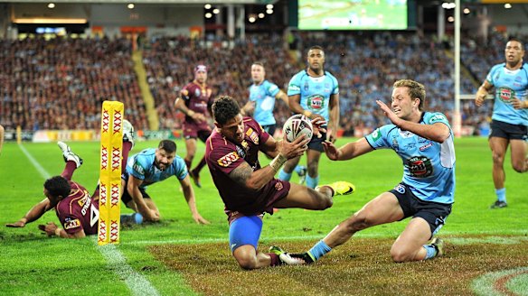 Dane Gagai scores a try for the Maroons.