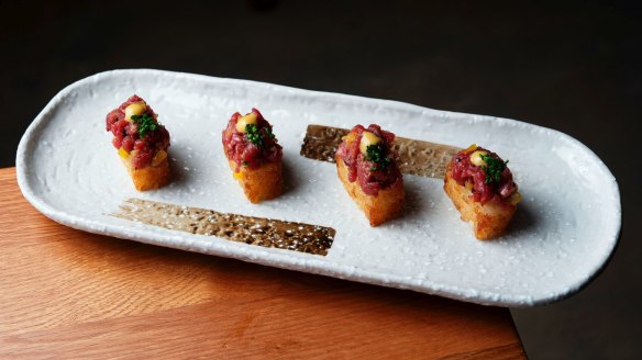 Go-to dish: Grass-fed beef tartare with crispy rice.