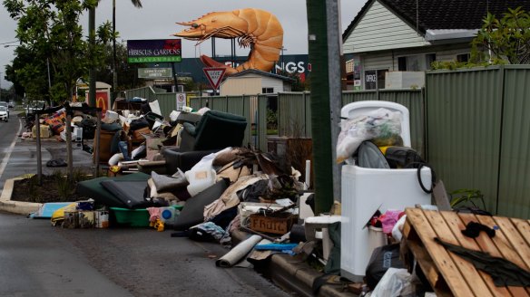 Streets in Ballina are lined with flood-damaged possessions on March 7.