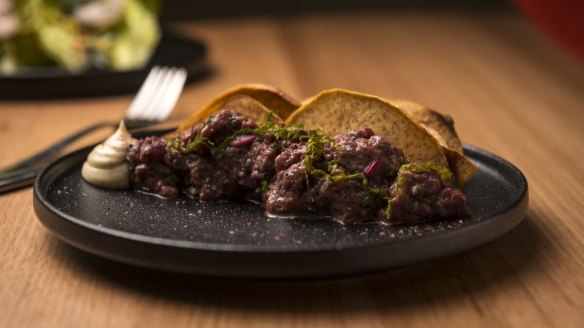 Kangaroo tartare with smoked oyster aioli and taro crisps.