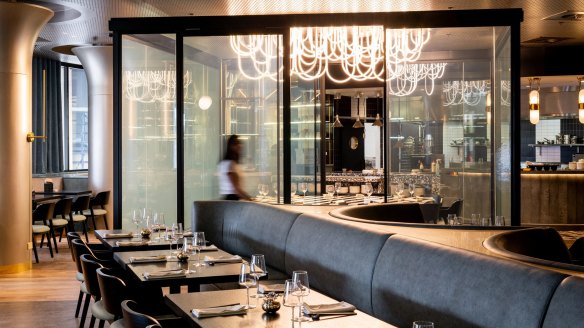The glass private dining room at Yugo becomes opaque at the push of a button. 