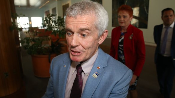 Malcolm Roberts with Pauline Hanson at Parliament House in Canberra on Friday after the High Court booted him from the Senate.
