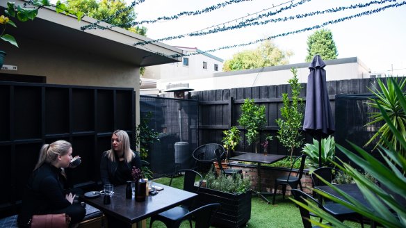 The fairy light-festooned courtyard.