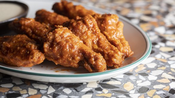 Buffalo wings are sticky and satisfying.