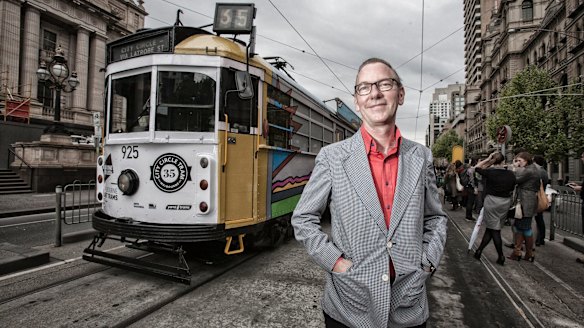Artist Jon Campbell, seen in 2013 with one of his designs for an art tram.