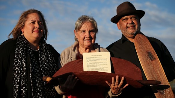 Megan Davis, Pat Anderson from the Referendum Council holding the Uluru statement, and Noel Pearson.
