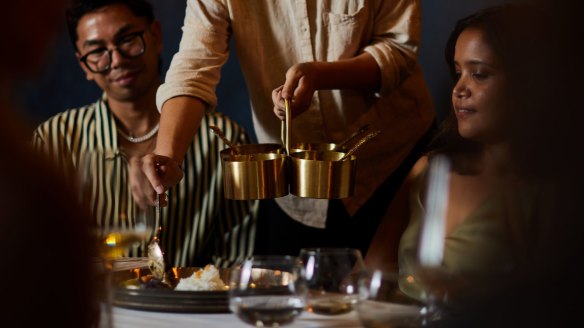 Bengali bohg (feast) is ladled out by waiters, thali restaurant-style.
