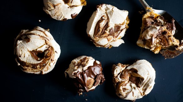 Choc-dipped chocolate ripple meringues.