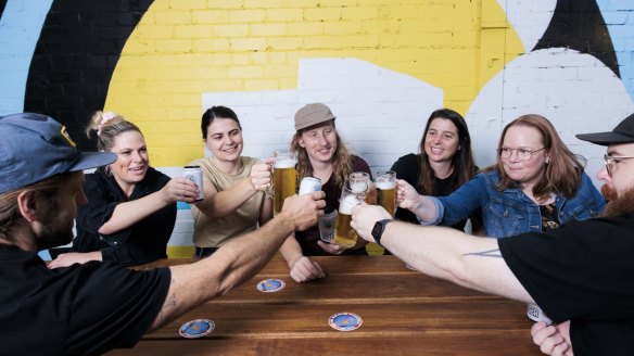 White Bay head brewer Dennis de Boer (centre) and staff members enjoy a few lagers.