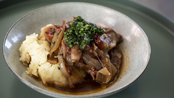 Slow-braised lamb shoulder, chickpea skordalia and gremolata.