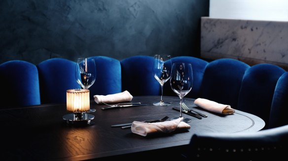 Royal blue is the dominant colour in the dining room, which Chris Lucas says is a nod to Venetian interiors.