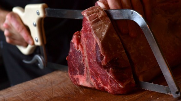 Bistecca executive chef Pip Pratt cuts steak to order at the Sydney CBD restaurant.