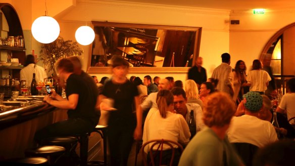 Don Peppino's 60-seat dining room is flanked by a handsome bar and giant mirror.