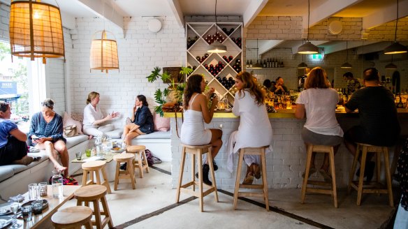 Locals catch up at Bar Elvina, Avalon.