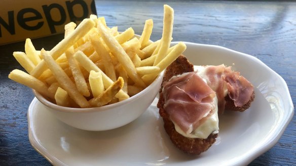 The kids' chicken parma comes with fries or salad at the Builders Arms Bistro.