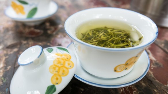 Steeping longjing tea at the traditional teahouse in Wenshu Temple, Chengdu, China.