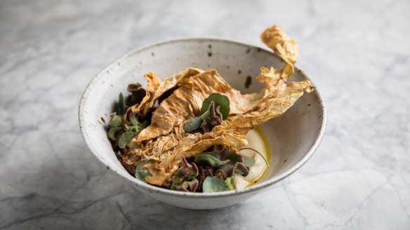 Roasted and pureed cauliflower with grilled radicchio and cabbage crackling. 