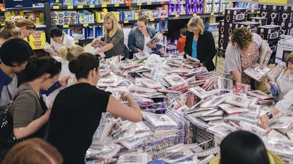 Mothers queued outside Aldi stores on to get their hands on Collette Dinnigan's clothing range for girls.