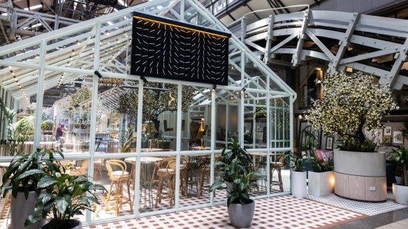 The restaurant features a new glasshouse. 