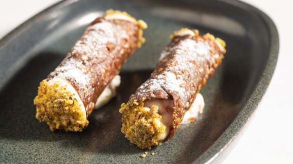 Cannoli filled with ricotta cream.