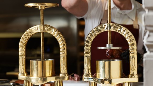 The giant golden duck presses at The Charles Grand Brasserie are kept in the open kitchen, visible without being confronting. 