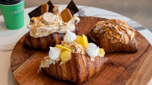 Banksia Bakehouse's famous croissants (from back left) the s'mores croissant, the Pina Colada croissant and the almond croissant. 