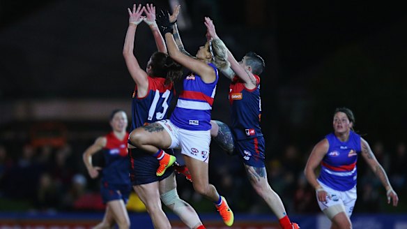 Bulldogs' Moana Hope marks the ball against Lauren Pearce of the Demons.