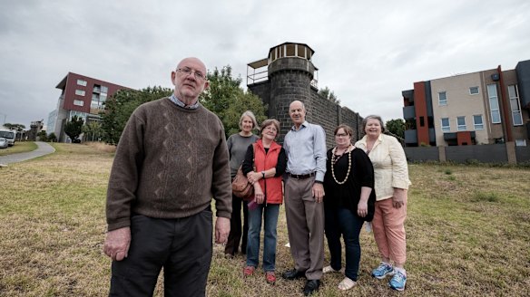 From left to right, opponents to the apartment block proposed to be built behind this guard tower at the former Pentridge prison: Michael Hamel-Green, Coucillor Sue Bolton, Olga Kimpton, Labor MP Kelvin Thomson, Felicity Watson (from the National Trust) and Luise Zanthyr.