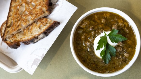 The shop offers take-home meals, soups and chicken broth (above). 