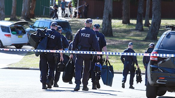 Police at the scene near where Hamad Assaad was shot dead at Georges Hall.