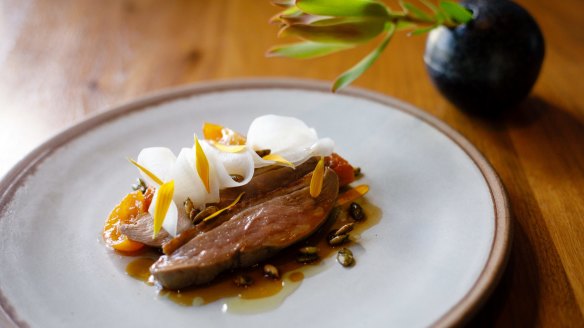 Duck breast, confit cumquat, roast pumpkin, and fermented daikon at two-hatted Aubergine.