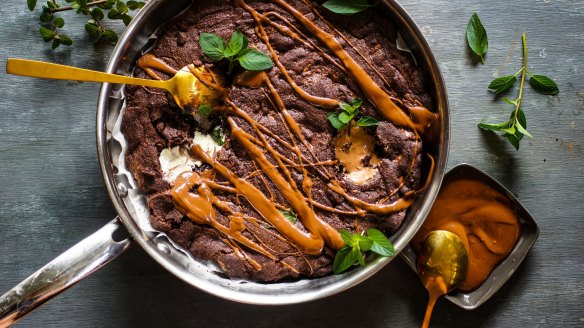 Giant triple chocolate cookie drizzled with hot fudge sauce.