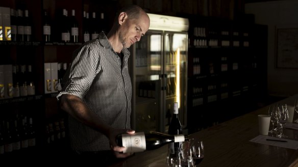Tyrrell's sommelier Nik Woodman pours a glass at the winery.