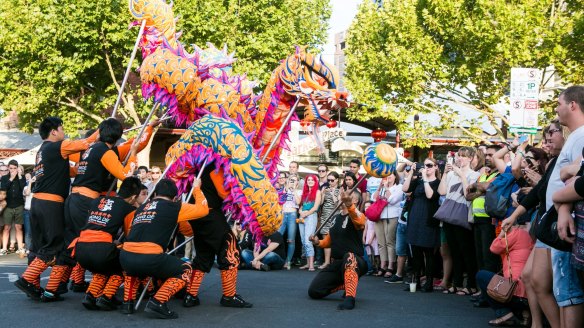 Traditional dragon dancing at Queen Victoria Market.
