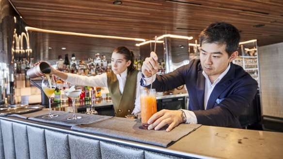 Bar staff at Sydney's Quay restaurant serve up some of their non-alcoholic cocktails. 
