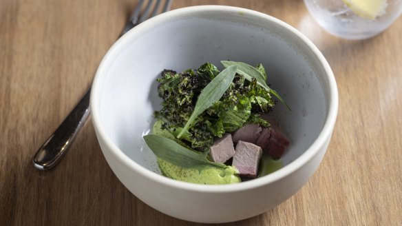 Go-to dish: Smoked venison with greens and charred broccoli.