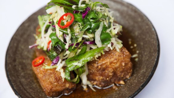 Red Spice Road's signature pork belly dish, with apple slaw, chilli caramel and black vinegar.
