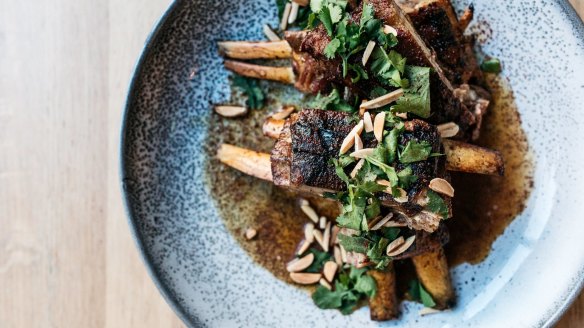 Twice-cooked saltbush lamb ribs with almond, sumac and coriander at The Alcott.