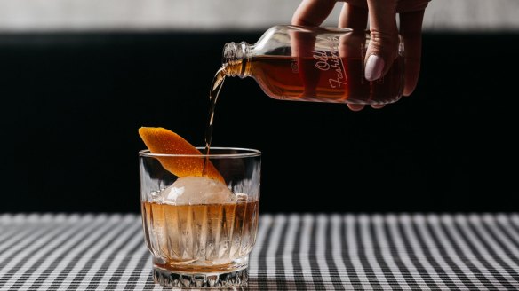 Waterside Hotel's Old Fashioned, batched in-house and bottled in a custom cocktail bottle.