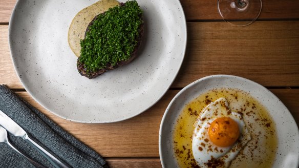 Chive covered steak and optional duck egg.