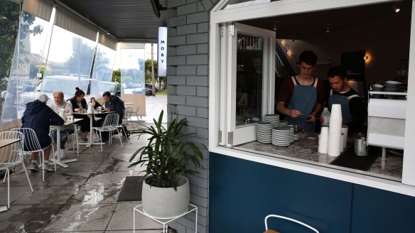 Moby's takeaway coffee window and sheltered pavement seating.