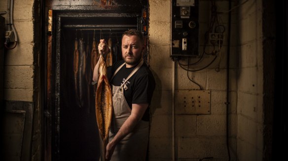 Nicholas Hill with his smoked longfin eels at Hungerford Meat Co in Branxton.